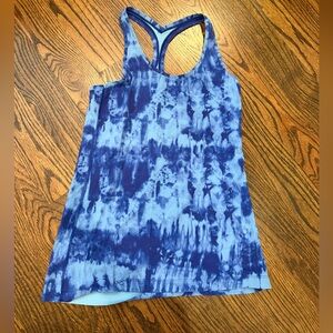 Lululemon cool racerback tank. Bright blue tie dye. Hem coming out. Size 6.